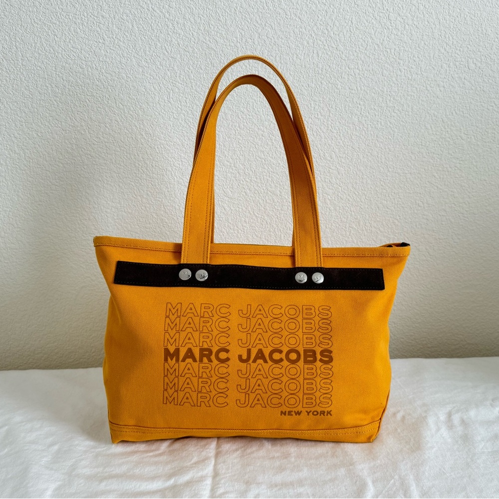 Marc Jacobs canvas tote with zipper.